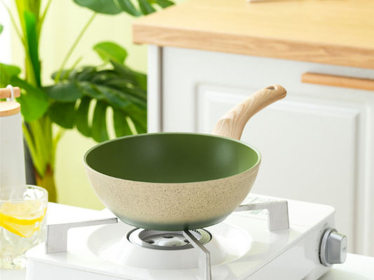 Ευπροσάρμοστο κινεζικό Wok τηγάνι 12Inch με το επίπεδο κατώτατο σημείο και την ανθεκτική στη θερμότητα λαβή